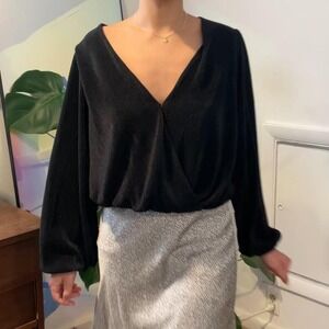 Black long sleeve blouse. astr the label size small